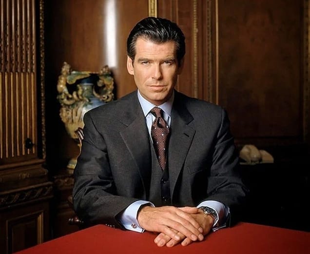 Pierce Brosnan as James Bond: 007. Suit of Choice? A bespoke Brioni.